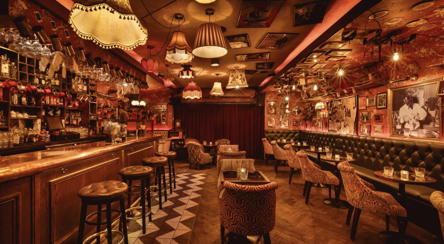 The Rabbit Hole warm interior bar with vintage lamps and lounge seating